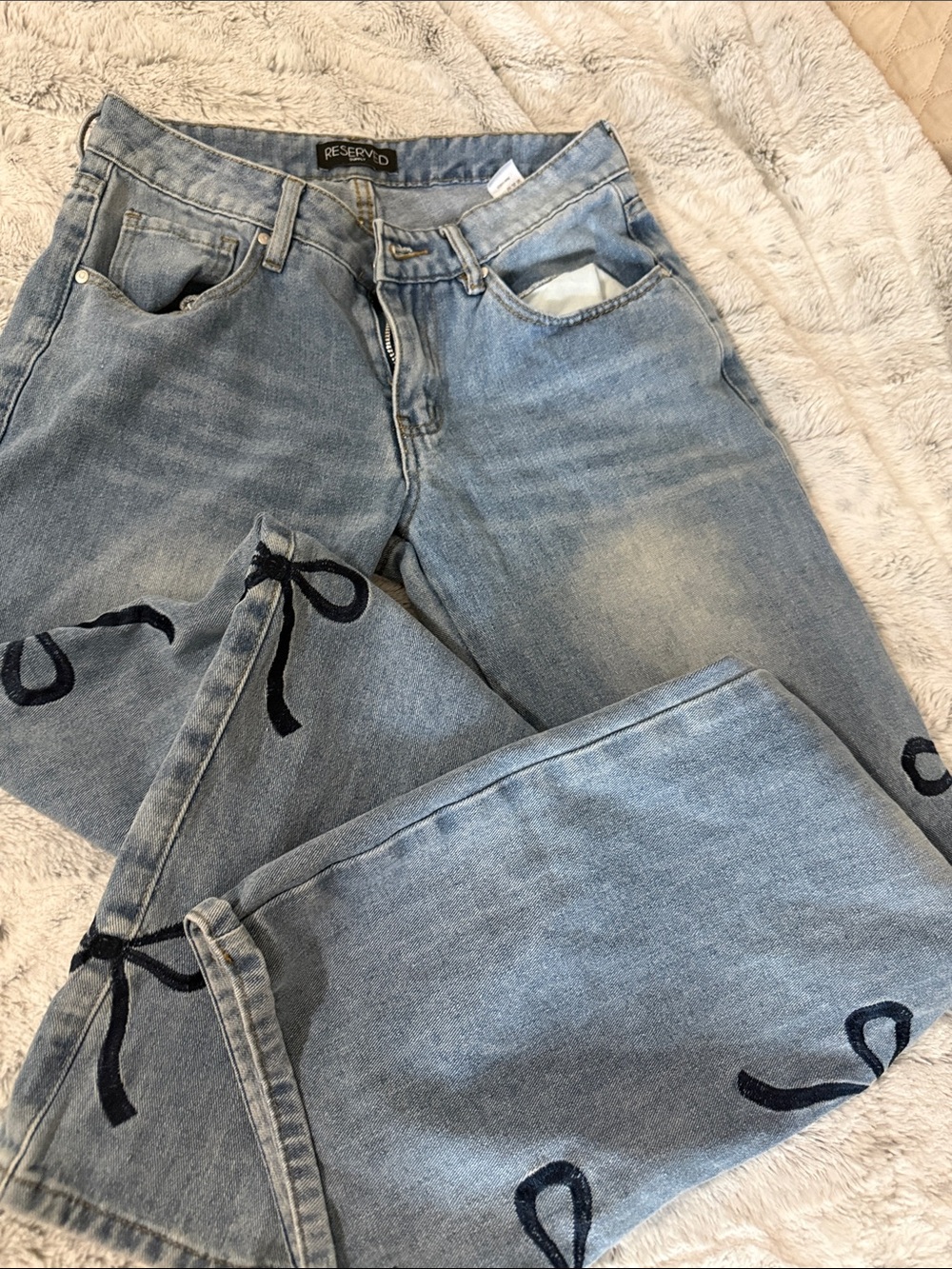 Reserved Light Blue Jeans with Navy Bow Embroidery